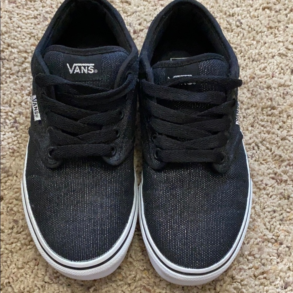 Black and metallic Vans